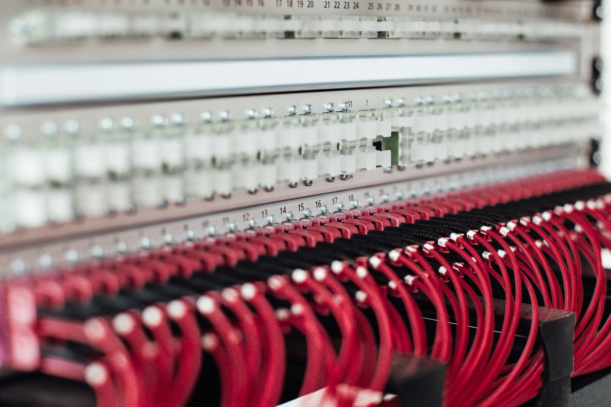 Network switch with red patch cables